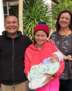 Refugee’s smile hides long and tortuous journey to safety