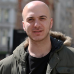 Refugee film-maker cleaning COVID hospital wards