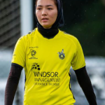 Refugee with round ball dreams