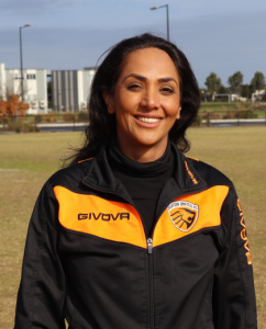 Migrant soccer coach ‘bending it like Beckham’